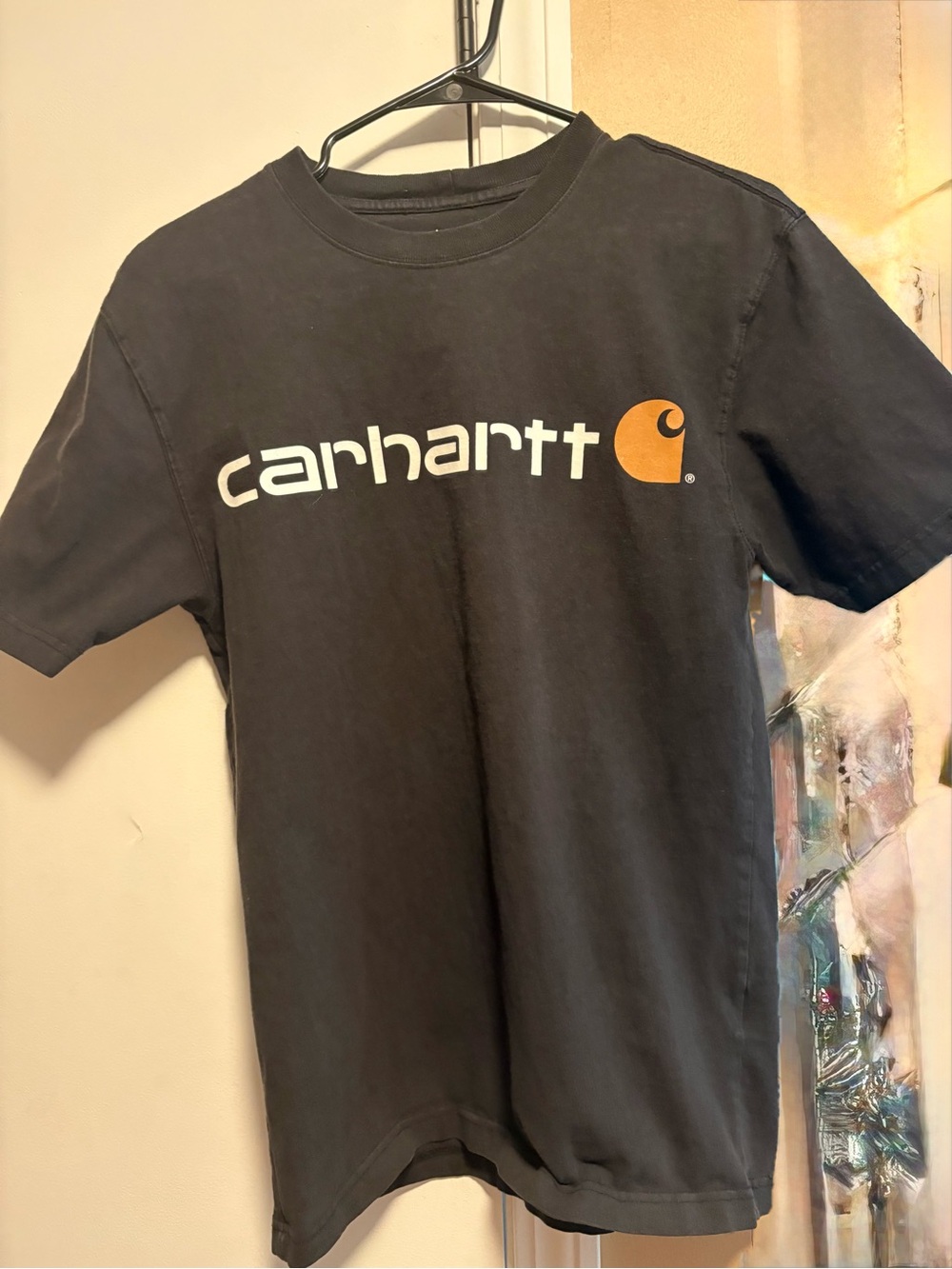 Carhartt Black Tee with White Logo and Orange Emblem